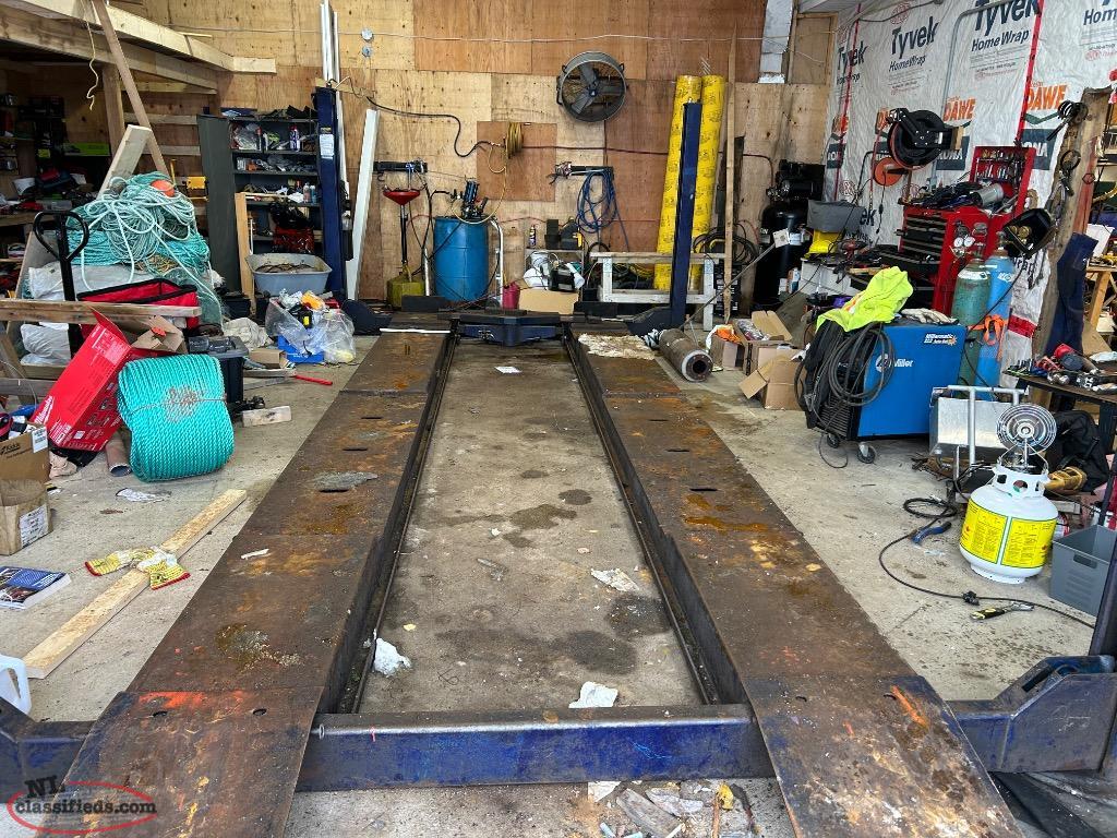 For Post vehicle ramp and two pumps with sprayers for doing ...